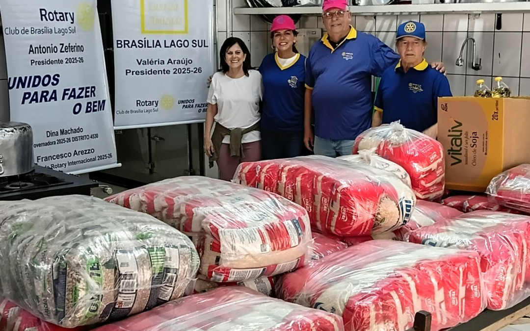Entrega de alimentos e apoio a piloto de kart